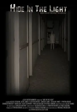 躲在灯光下封面图